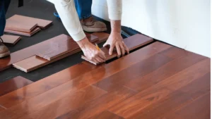 Professional solid hardwood flooring installation in progress