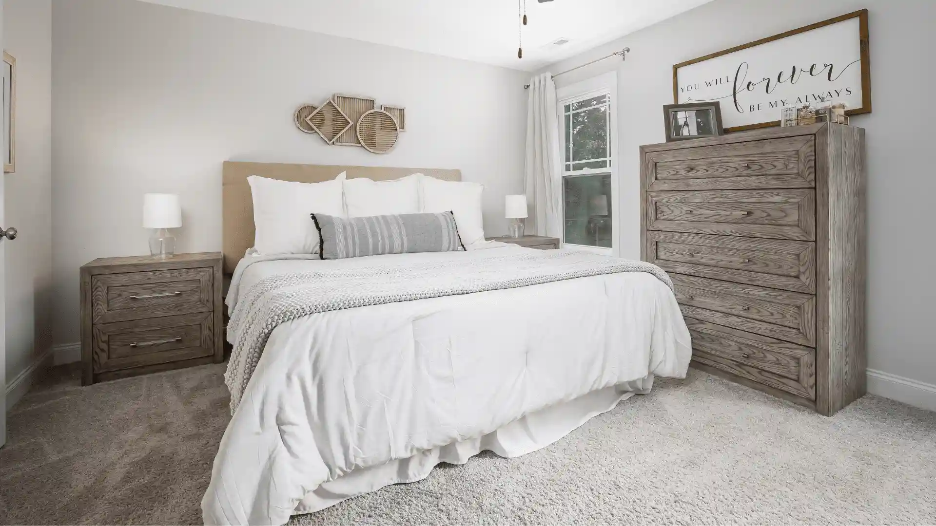 Carpet flooring installed in a bright Raleigh, NC bedroom